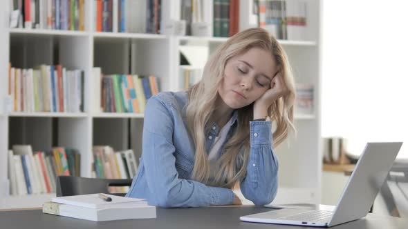 Tired Young Woman Sleeping at Work Workload