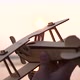 the Child Holds a Plane in His Hand Against the Setting Sun Simulates the Flight - VideoHive Item for Sale