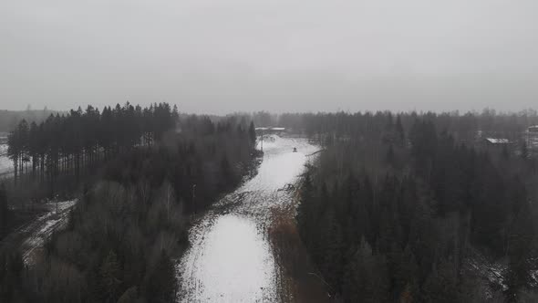 First Snow on Ski Slope Scandinavia Coniferous Forest Forward Aerial