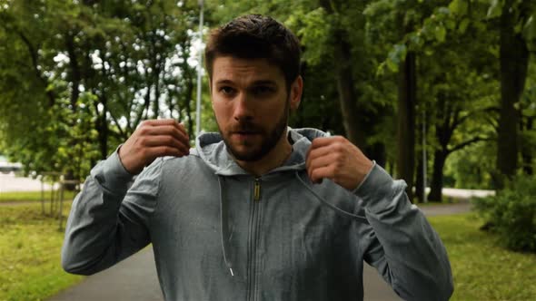 Young Sport Man Running in the Park