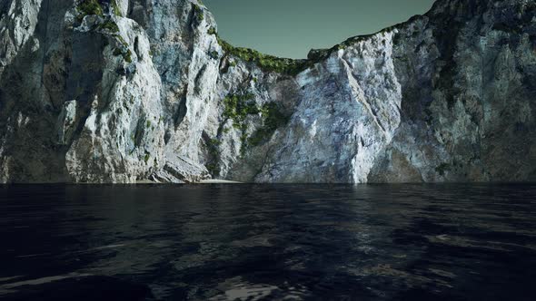 View of a High Cliff and Black Ocean