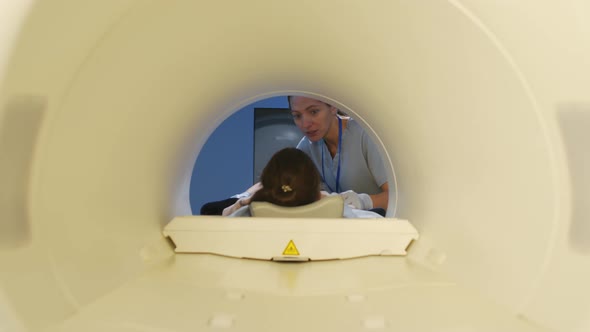 Patient in Tube of MRI Scanner