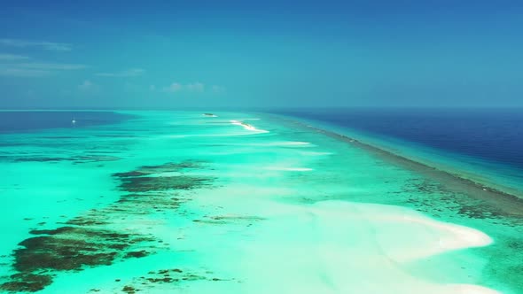 Aerial top down scenery of luxury resort beach voyage by clear ocean and white sand background of a 