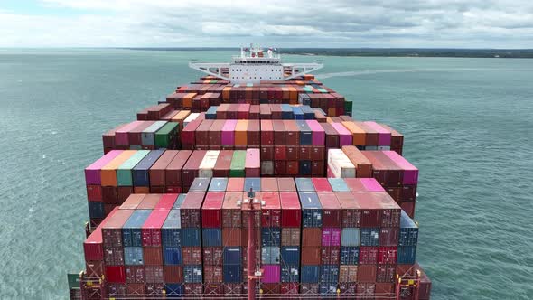 Fully Loaded Container Ship at Sea Transporting Cargo Around the World