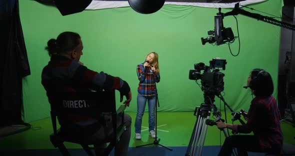 Woman Singing at an Audition