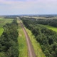 Railroad Through green grassed countryside, Aerial - VideoHive Item for Sale