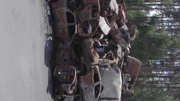 Vertical Video of a Dump of Destroyed Cars During the War in Ukraine