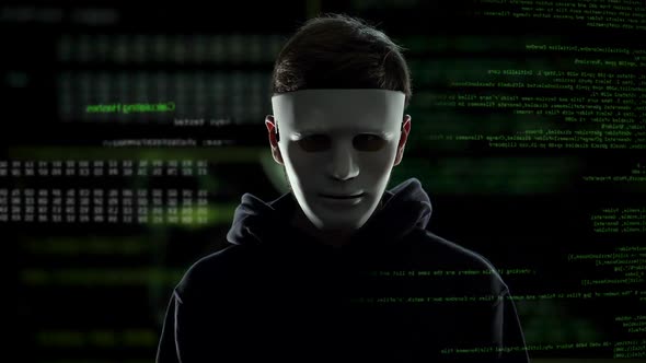 Anonymous Scary Hacker Taking Off Mask, IT Criminal Disclosure, Confession