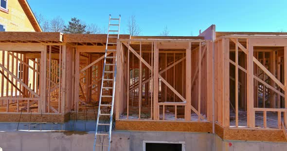 Exterior View of a New House Under Construction Framing