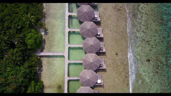 Aerial sky of beautiful lagoon beach break by aqua blue ocean with white sandy background of a dayou