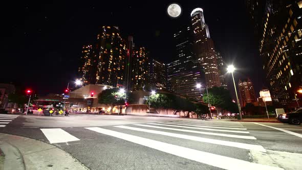 A time lapse of Downtown LA at night during a full moon.