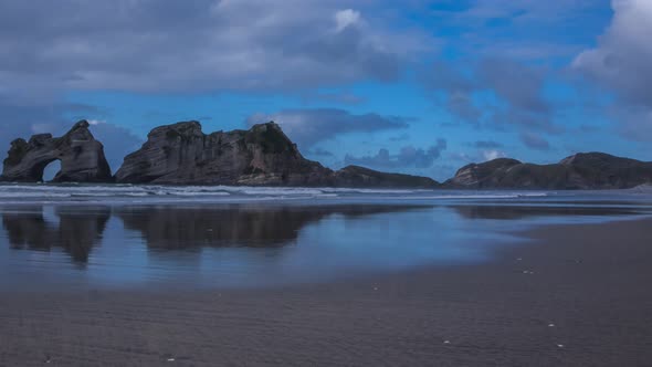 Wharariki Beach with rock arch