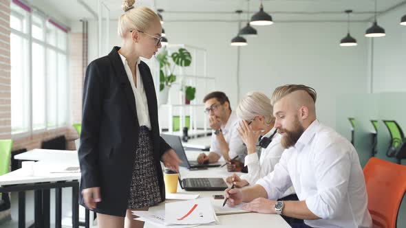 Angry Female Director Is Dissatisfied with Work of Employees