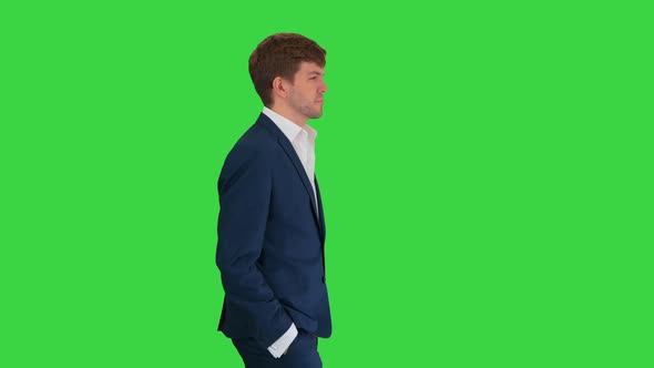 Young Confident Businessman Walking His Hands His Pockets Green Screen Chroma Key