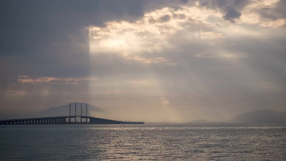 Timelapse view sun ray over Penang Bridge