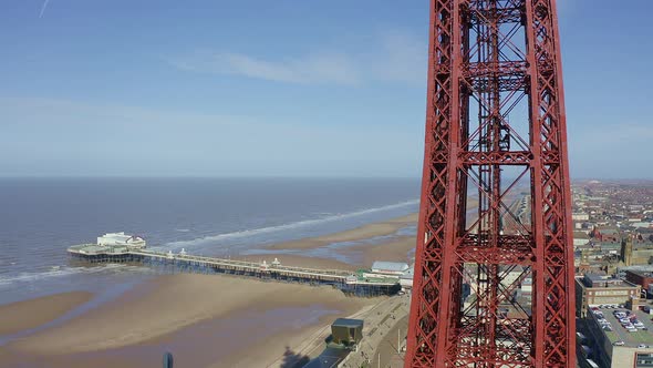 Aerial footage, drone view , of the famous Blackpool Tower and beach from the sky on a beautiful Sum
