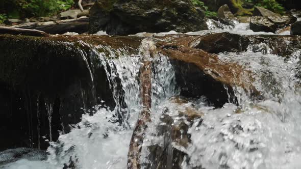 Close Up of Mountain River. Stream Flow with Rocks