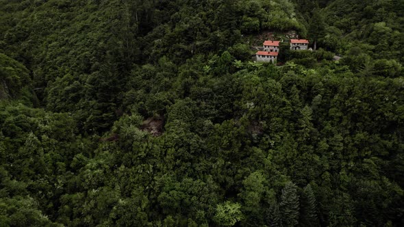 Aerial View of Remote House in Tropical Forest