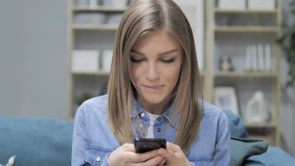 Young Girl Busy Using Smartphone Applications