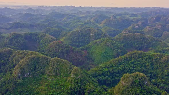 Green Hills With Lush Vegetation In Los Haitises, Dominican Republic - aerial drone shot
