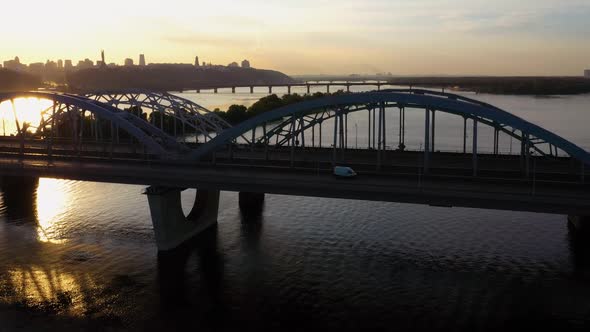 City Bridge and Sunlight Reflection on the River