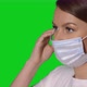 Young Caucasian Beautiful Woman Put on Protective Face Mask - VideoHive Item for Sale