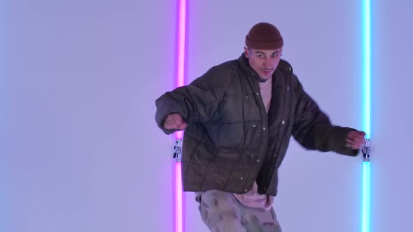 Hip Hop Performed By a Fashionable Guy in a Jacket and Youth Clothing