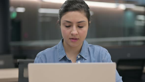 Close Up of Indian Woman Working on Laptop