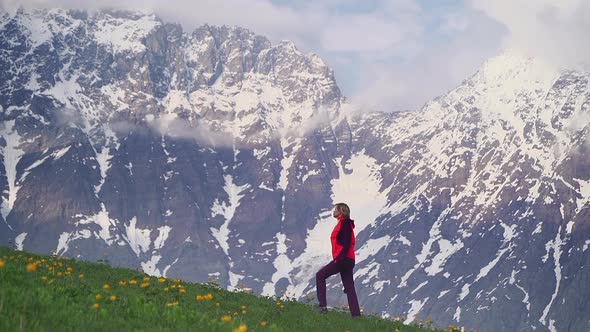 Hiking Woman Going Up Mountain Slope