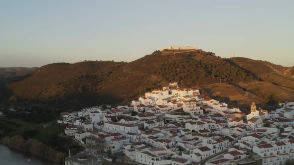 Aerial drone view of Sanlucar de Guadiana in Spain, from Alcoutim in Portugal