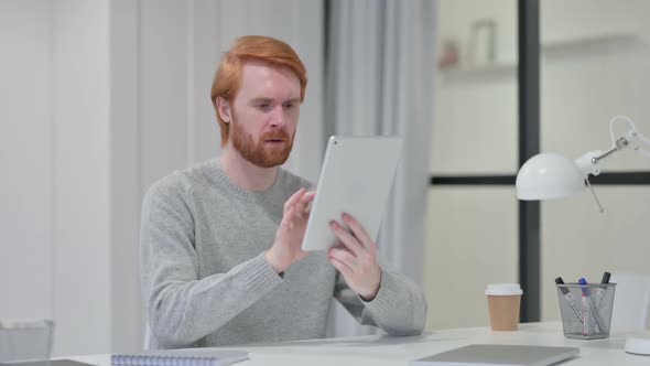 Disappointed Beard Redhead Man Having Loss on Tablet