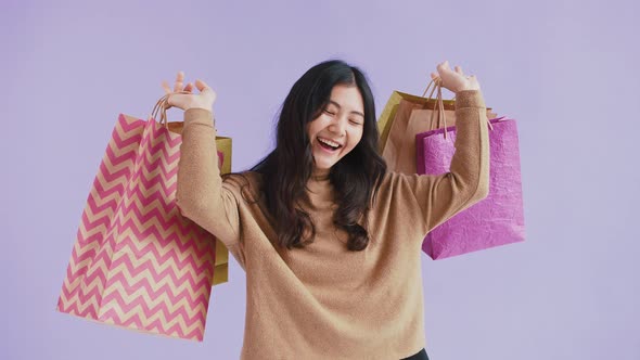 Asian Teenager in Brown Sweater