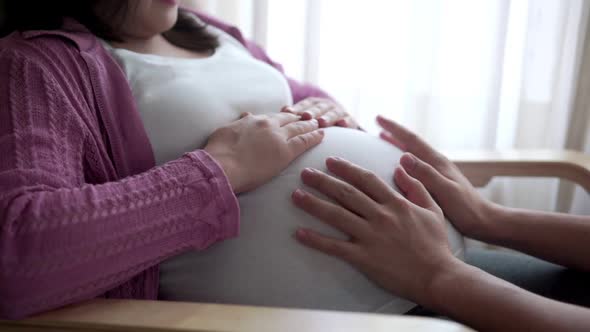 Pregnant Couple Feels Love and Relax at Home