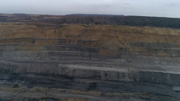 Aerial view of coal quarry with site loaded with explosives 08