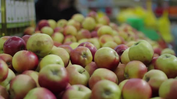 Beautiful Ripened Red and Yellow Apples in Supermarket Marketplace