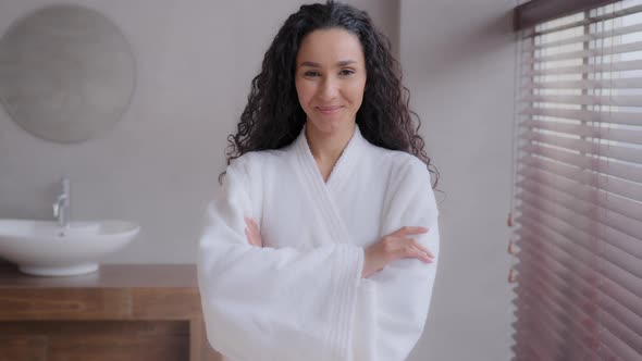 Young Attractive Hispanic Woman Standing Wear Bathrobe in Bathroom Confident Female Model Posing