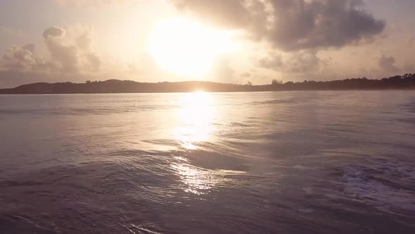 4k 24 Fps Sunrise In The Caribbean Beach In The Mornig With Waves In The Sun 1