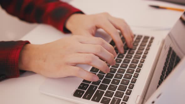 Close Up Hands Typing on the Laptop