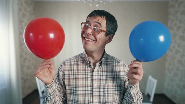 Nerd with Red and Blue Balloon