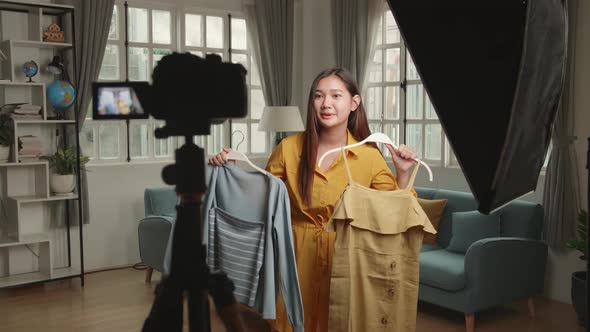 Fashion Blogger Woman Showing Casual Colourful Shirts On Camera