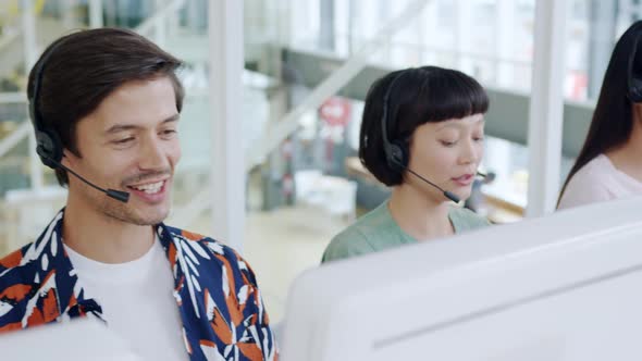 Call centre staff working in a modern office