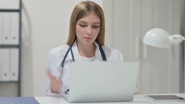 Video Chat on Laptop By Female Doctor