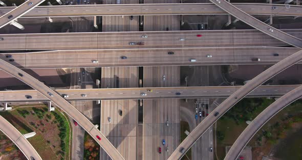 Birds eye drone view of traffic on I-10 West and Beltway 8 freeway in Houston, Texas