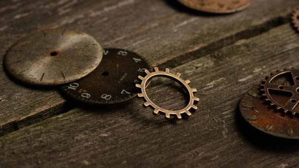 Rotating stock footage shot of antique and weathered watch faces - WATCH FACES 064