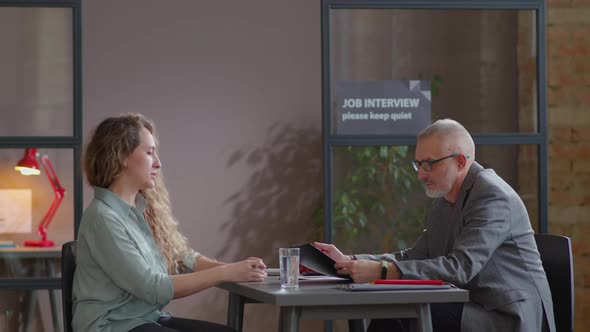 Woman Speaking with Senior HR Manager on Job Interview