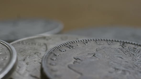 Rotating stock footage shot of antique American coins - MONEY 0114