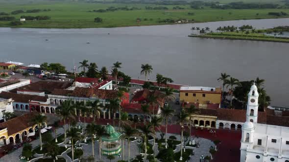 Drone shot of the Papaloapan river and the downtown Tlacotalpan, Veracruz