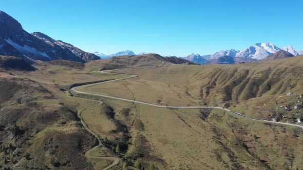 Mountain pass road aerial view with beautiful scenery on background in the Do