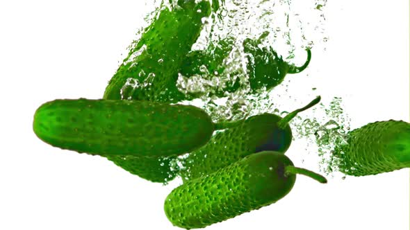 Super Slow Motion Fresh Cucumbers Underwater with Air Bubbles