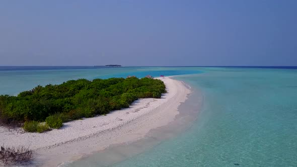 Aerial drone tourism of resort beach by blue sea with sand background